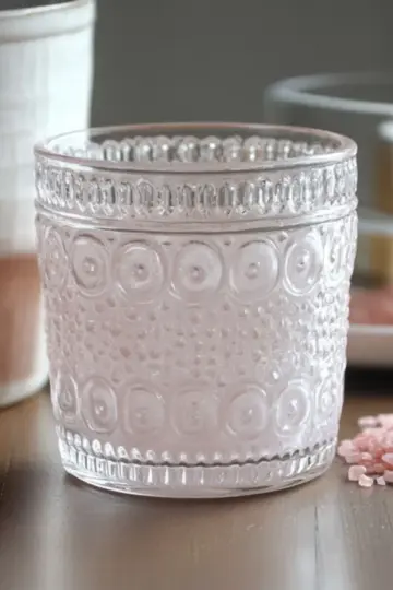 Step by step pink salt trick recipe preparation showing pink Himalayan salt, ACV, honey and finished drink