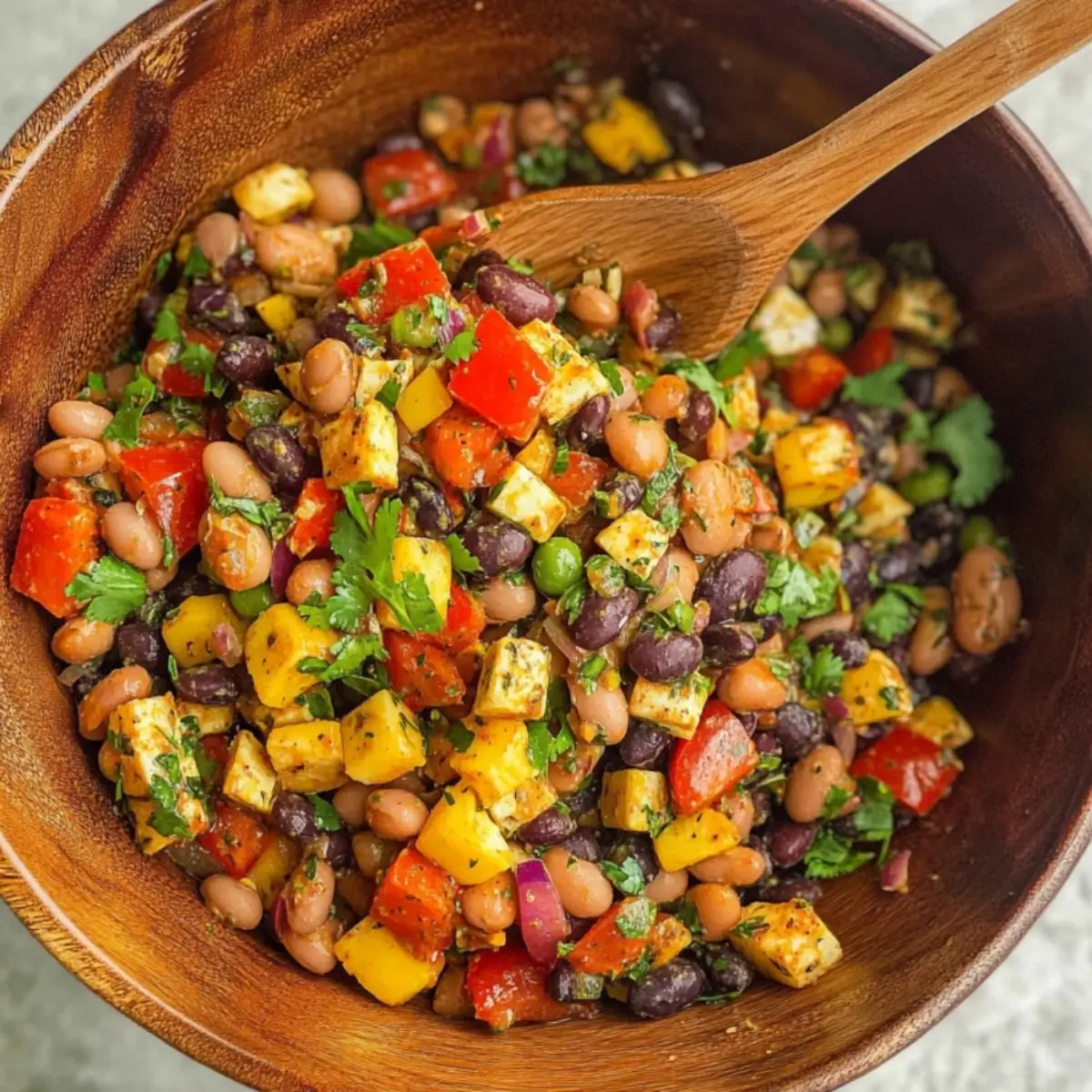 Southwest Dense Bean Salad Recipe 8 Dense bean salad recipe with grilled chicken, black beans, cherry tomatoes, and jalapeños ready for meal prep